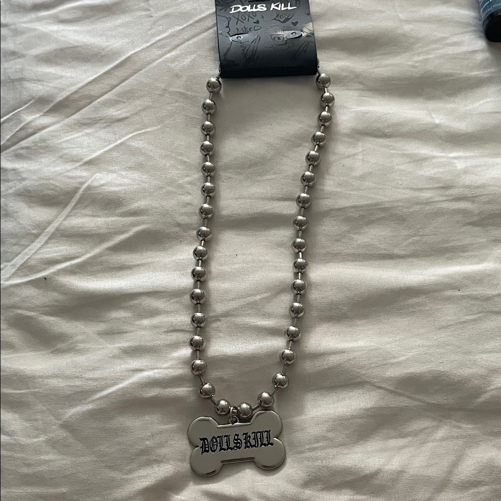 Dolls Kill Metallic Bone Pendant Necklace
